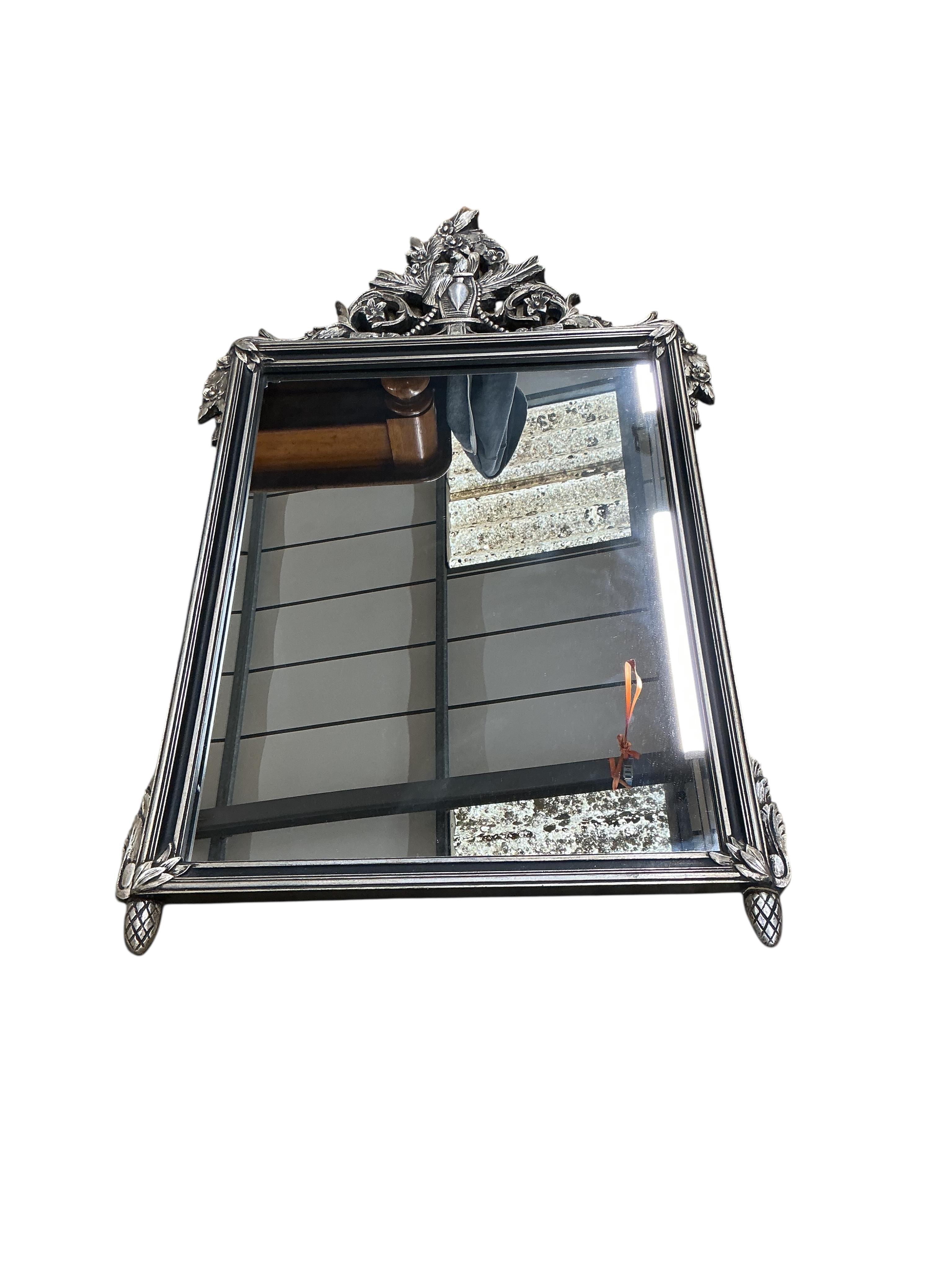 A reproduction Victorian style silvered composition wall mirror, width 76cm, height 120cm